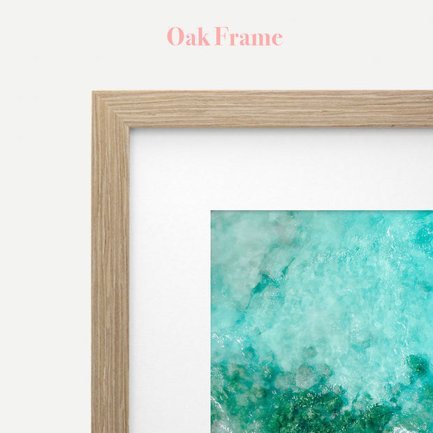 a picture frame with a picture of the ocean