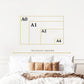a bed with a white comforter and a white wall