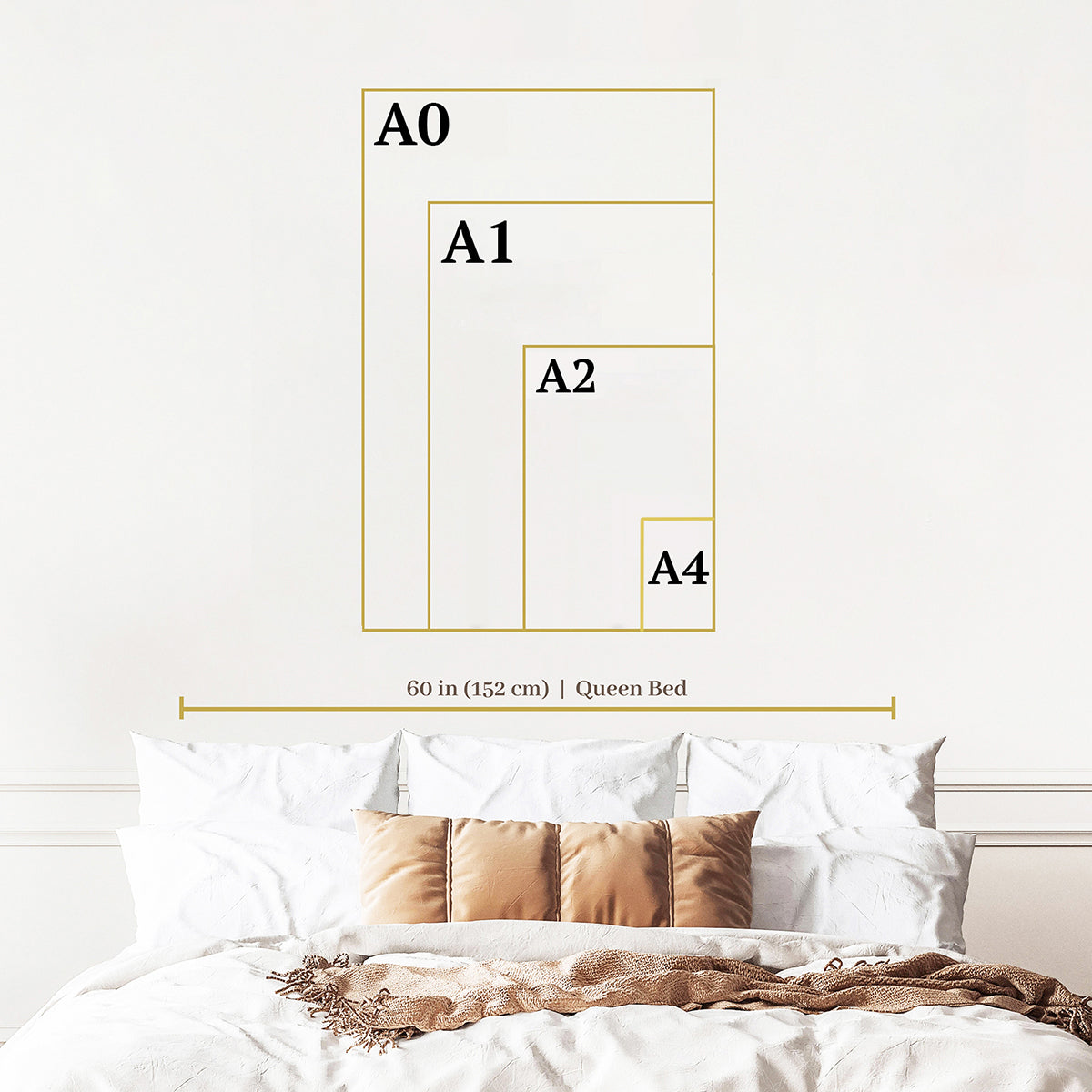 a bed with a white comforter and a white wall